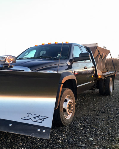Snowline Alaska truck has state the art equipment to deal with any winter related challenge, including sanding and snow plowing 